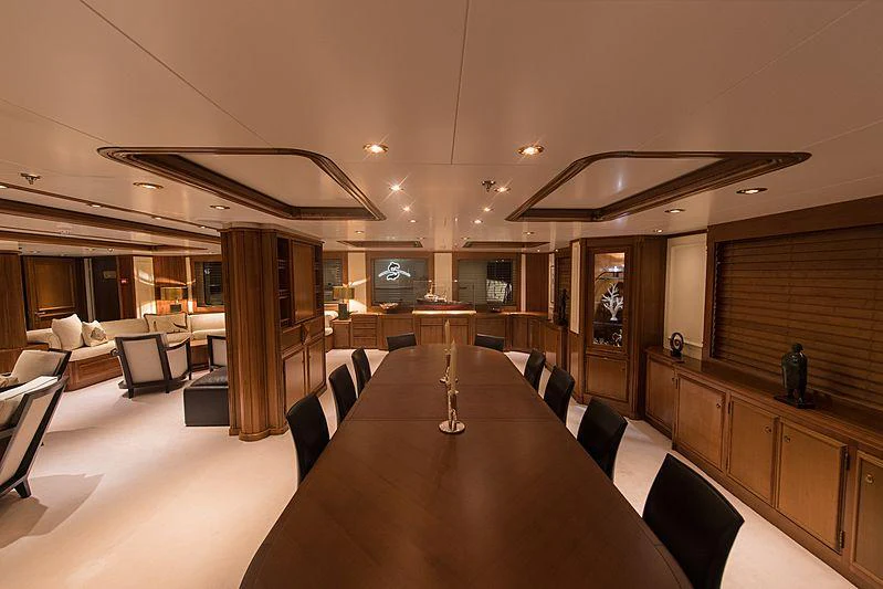 a large room with a table and chairs aboard SEAWOLF Yacht for Charter