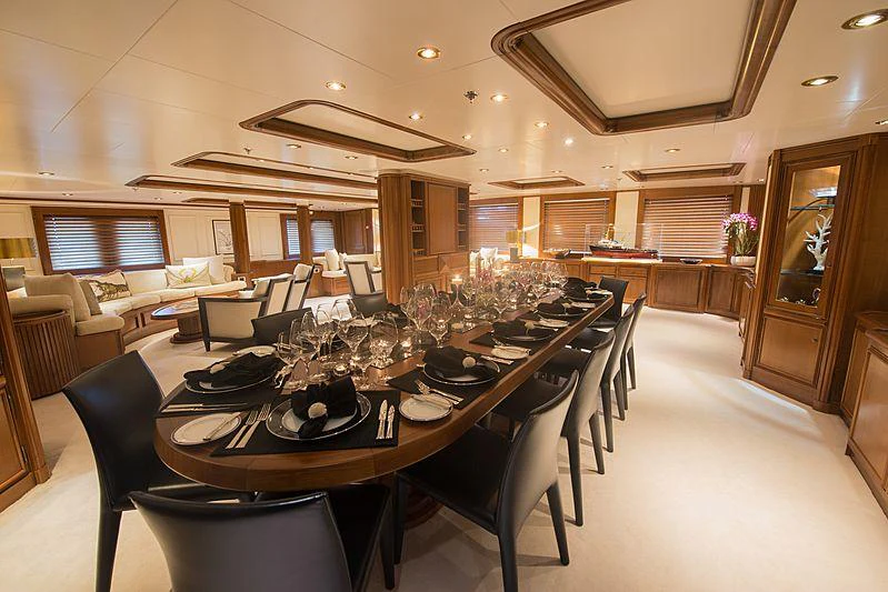 a dining room with a table set aboard SEAWOLF Yacht for Charter