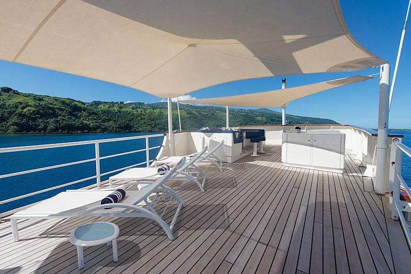a deck with a large pool aboard SEAWOLF Yacht for Charter
