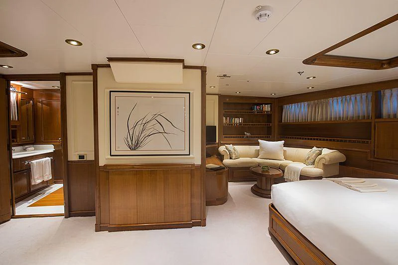 a room with a bed and a tv aboard SEAWOLF Yacht for Charter