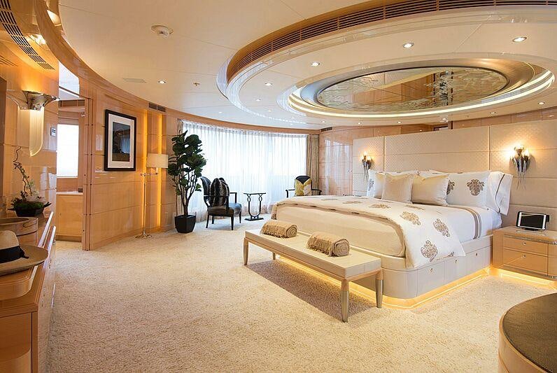 a large bedroom with a large bed aboard SOUTH Yacht for Charter