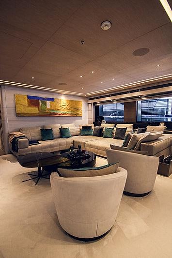 a living room with a couch and a coffee table aboard SEVERIN*S Yacht for Charter