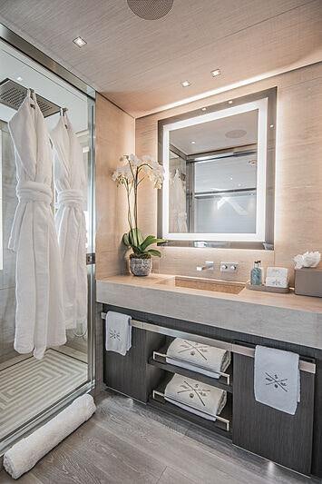 a bathroom with a sink and mirror aboard SEVERIN*S Yacht for Charter