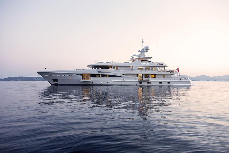 a large white ship on the water aboard KAMALAYA Yacht for Charter
