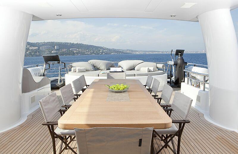 a room with a table and chairs aboard SPIRIT Yacht for Charter