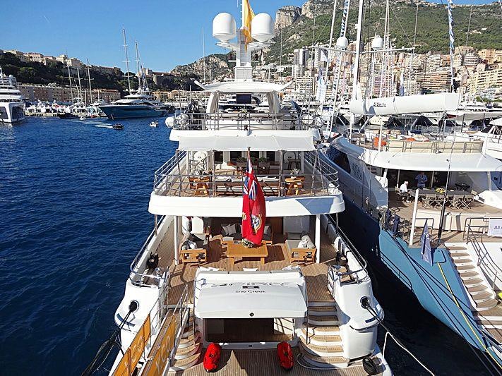 a boat docked at a pier aboard SPIRIT Yacht for Charter