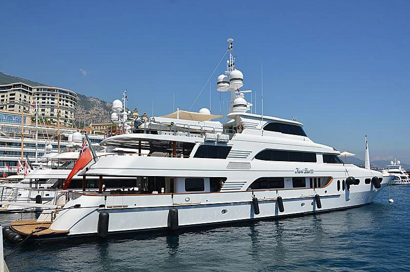a large white yacht in the water aboard KERI LEE III Yacht for Charter