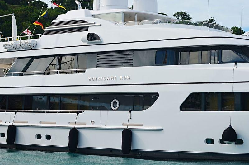 a white yacht on the water aboard HURRICANE RUN Yacht for Charter