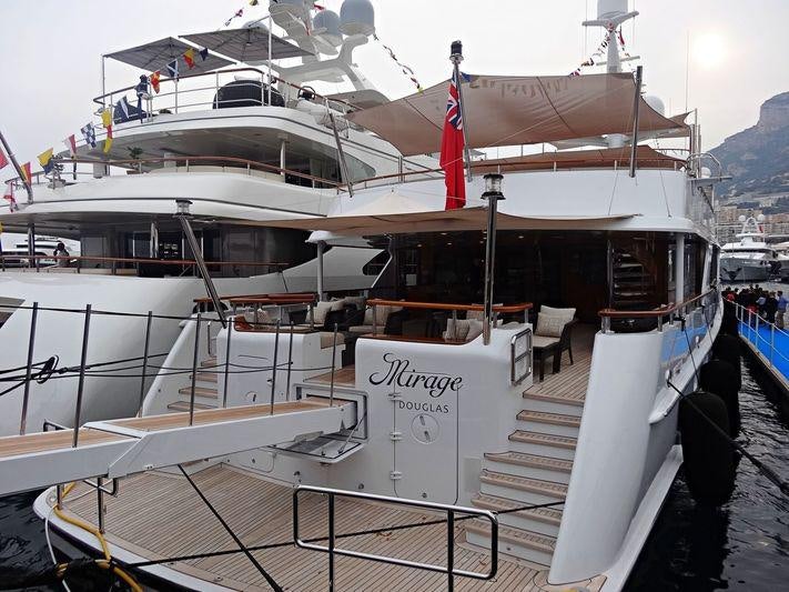 a boat docked at a pier aboard MIRAGE Yacht for Charter
