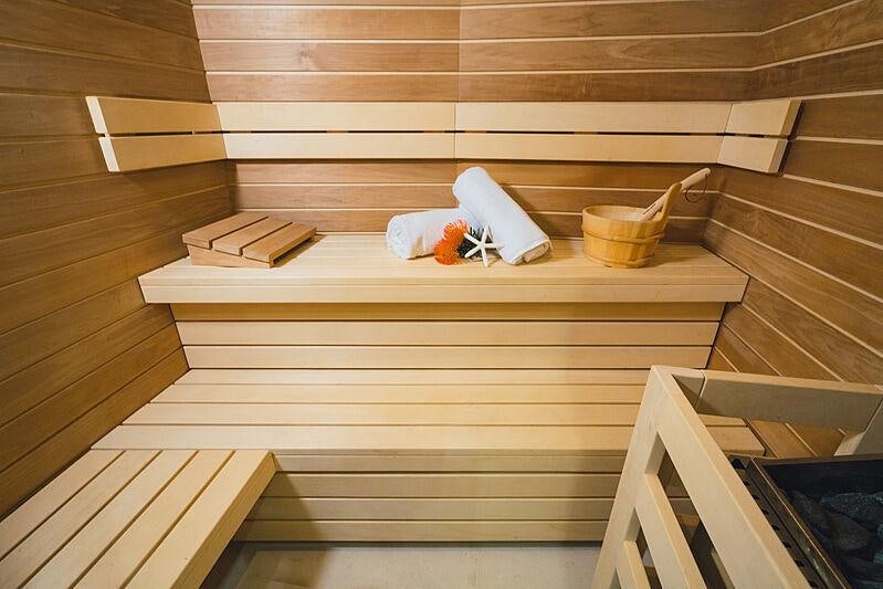 a wooden shelf with a basket and a sink aboard MIKHAIL S. VORONTSOV Yacht for Charter