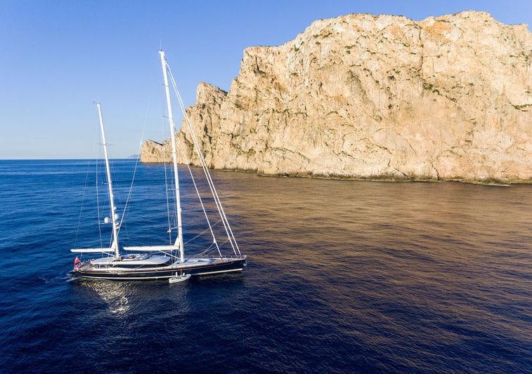 a boat sailing in the sea aboard Q Yacht for Charter