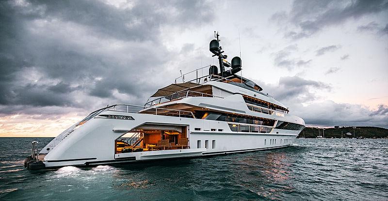a large white boat on the water aboard SEVEN SINS Yacht for Charter