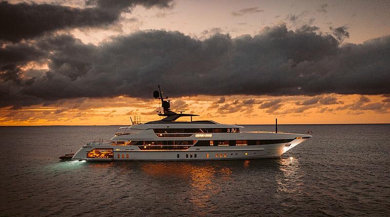 a large white boat in the water aboard SEVEN SINS Yacht for Charter