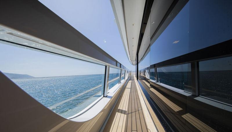 a wooden walkway over water aboard SEVEN SINS Yacht for Charter
