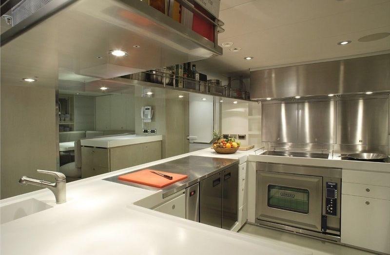 a kitchen with a large oven aboard RED DRAGON Yacht for Charter