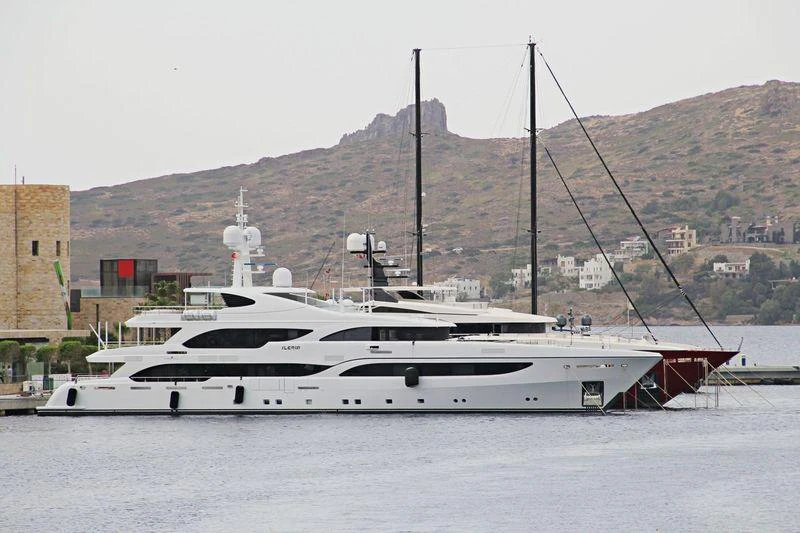 a white yacht in the water aboard ILERIA Yacht for Charter