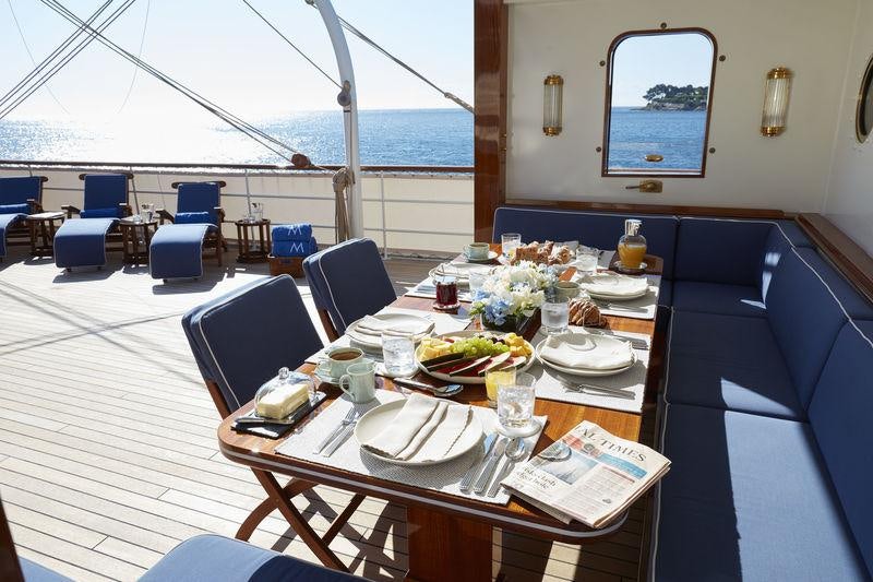 a table with food on it aboard MALAHNE Yacht for Charter