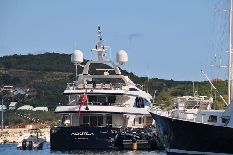 a boat docked at a pier aboard COME PRIMA Yacht for Charter