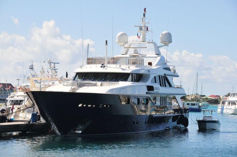 a large boat in the water aboard COME PRIMA Yacht for Charter