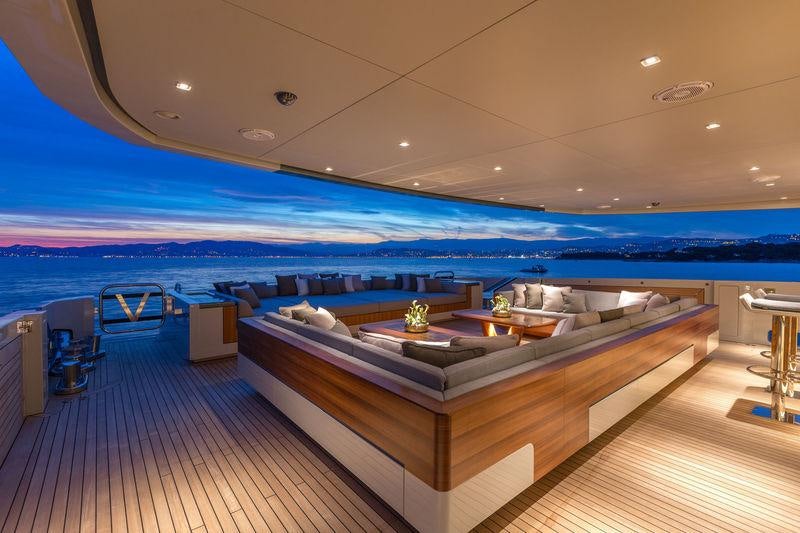 a room with a large bed aboard VERTIGE Yacht for Charter