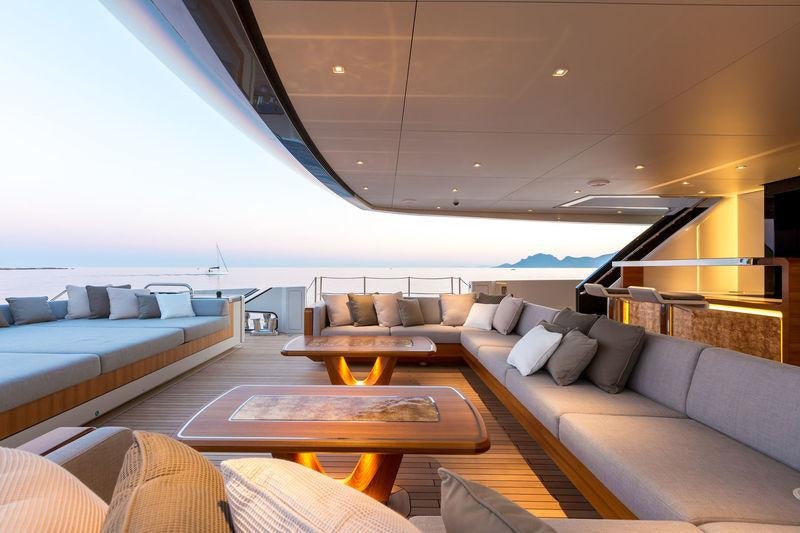 a living room with a couch and a table aboard VERTIGE Yacht for Charter