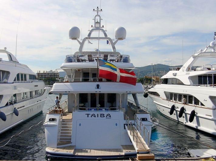 several boats in a harbor aboard AKIRA ONE Yacht for Charter