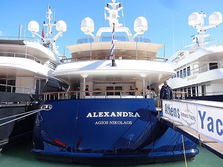 a group of people on a boat aboard ALEXANDRA Yacht for Charter