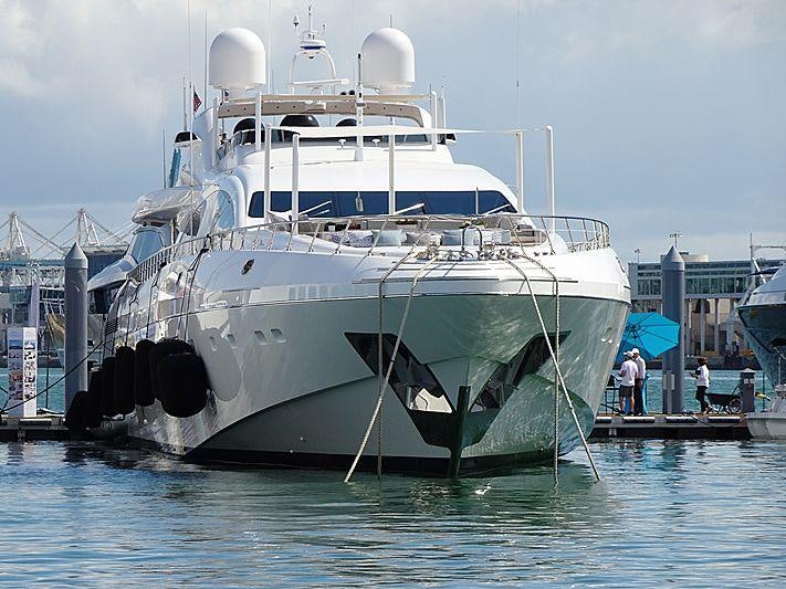 a large white boat in the water aboard (DELETE)INCOGNITO Yacht for Charter