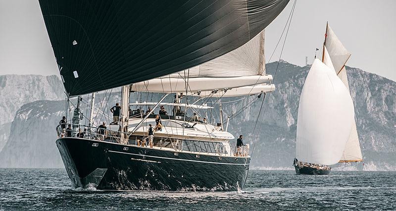 a group of people sailing on a boat in the water aboard PERSEUS Yacht for Charter