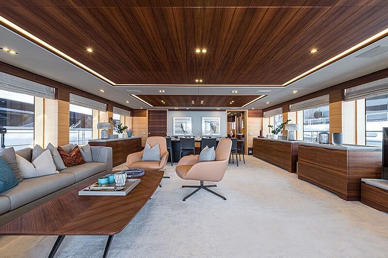 a living room with a large open floor plan aboard TRIUMPH Yacht for Charter