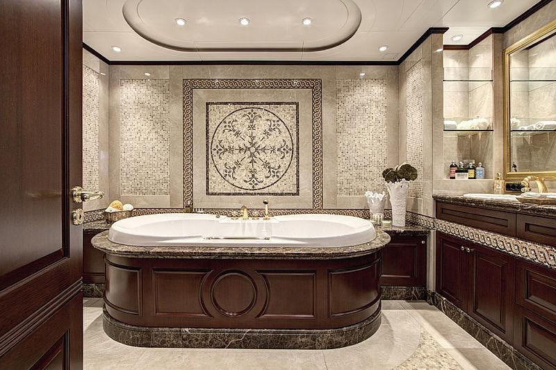 a bathroom with a large marble counter aboard AZTECA Yacht for Charter