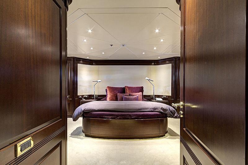 a bed in a room aboard AZTECA Yacht for Charter