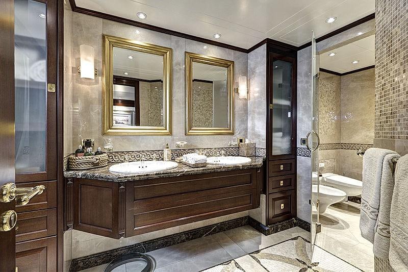 a bathroom with a large mirror aboard AZTECA Yacht for Charter