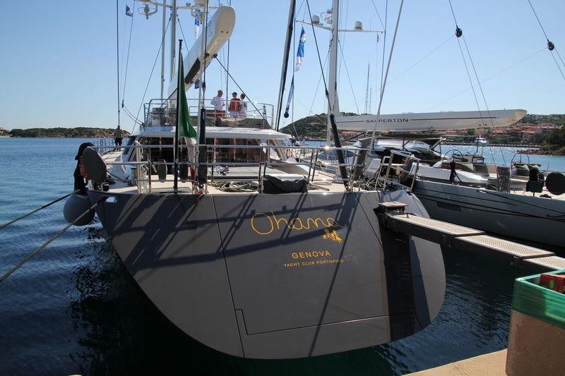 a boat docked at a pier aboard OHANA Yacht for Charter