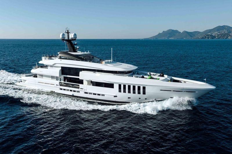 a white boat on the water aboard OURANOS Yacht for Charter
