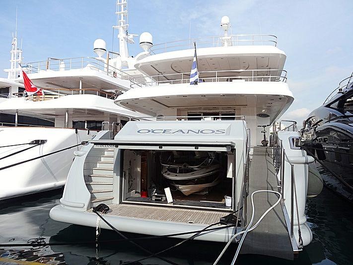 a white yacht in the water aboard OCEANOS Yacht for Charter
