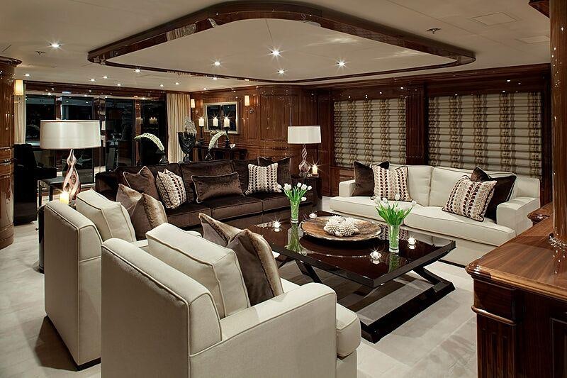 a living room with a large window aboard REMEMBER WHEN Yacht for Charter