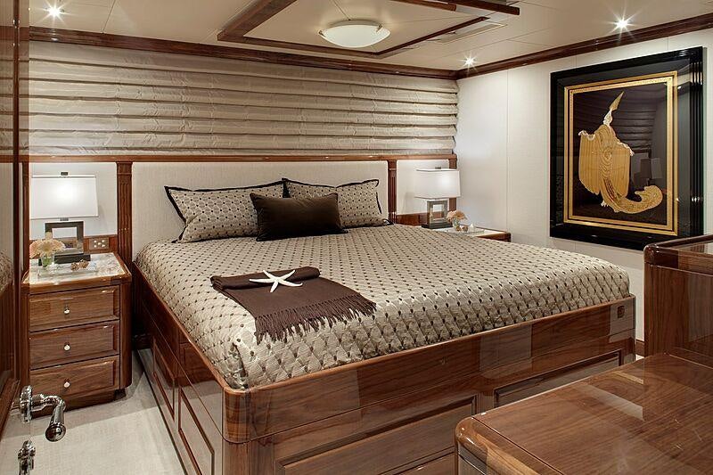 a bed with a large bed aboard REMEMBER WHEN Yacht for Charter