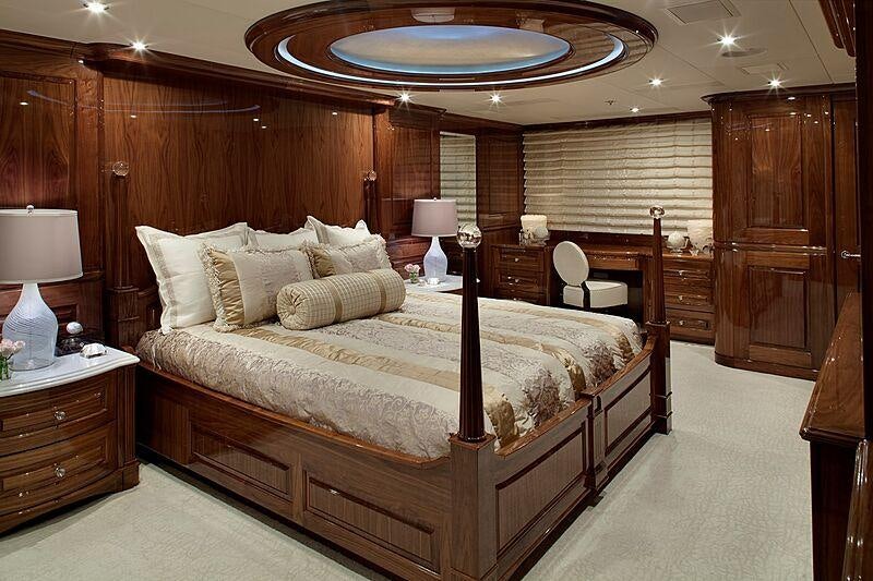 a large bedroom with a large bed aboard REMEMBER WHEN Yacht for Charter
