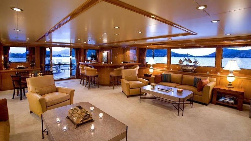 a living room with a large window aboard TE MANU Yacht for Charter