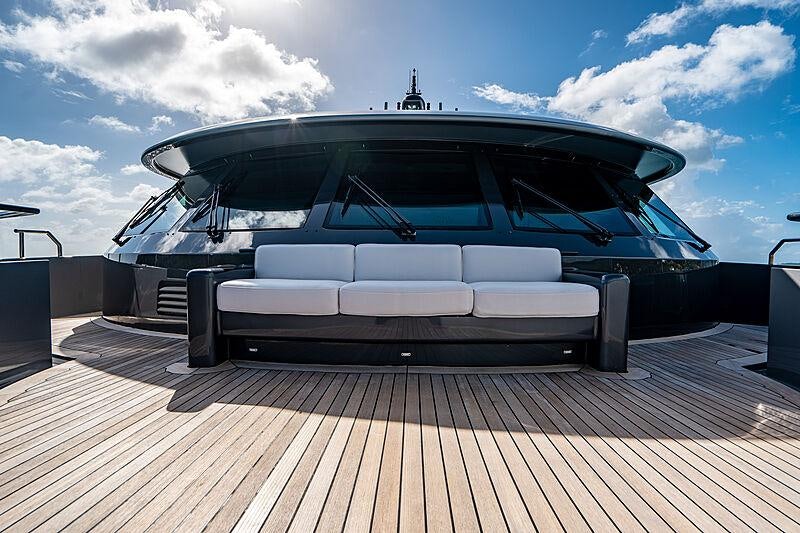a large glass boat on a dock aboard VIBRANCE Yacht for Charter
