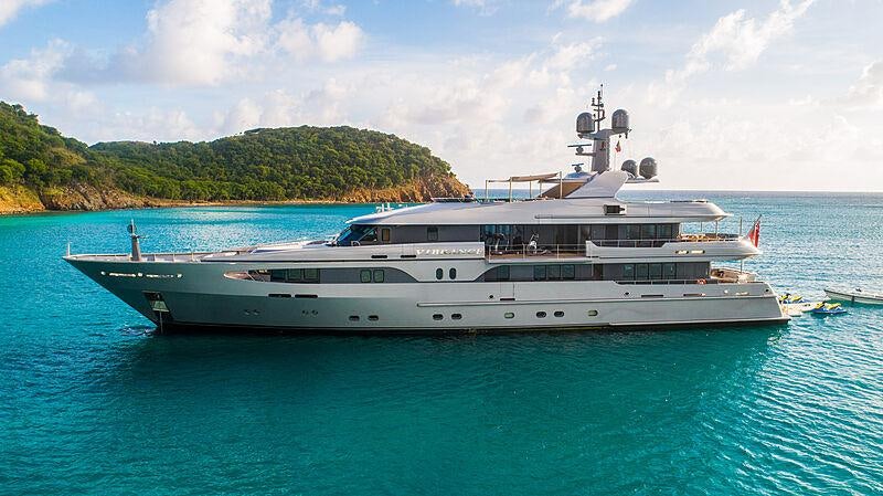 a large white boat in the water aboard VIBRANCE Yacht for Charter