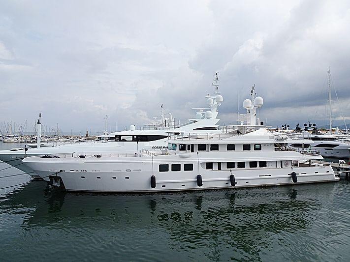 a large white boat in the water aboard R23 Yacht for Charter