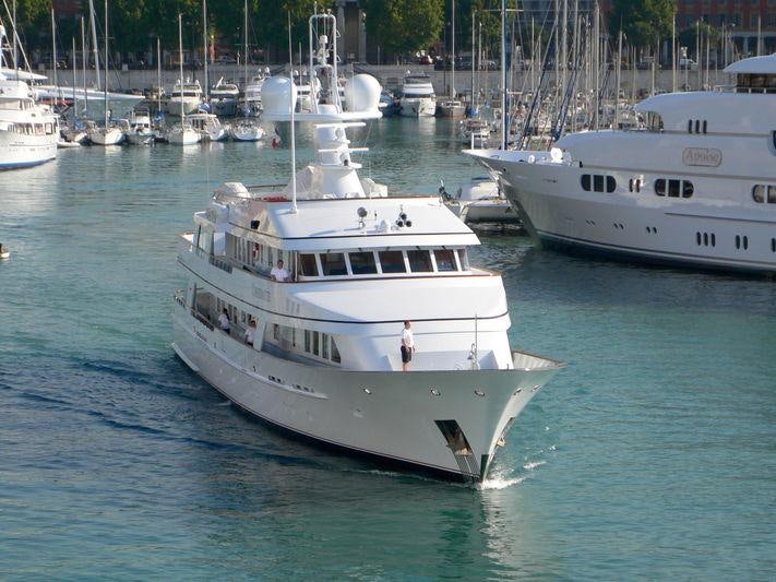 a large white boat in the water aboard GENESIA Yacht for Charter