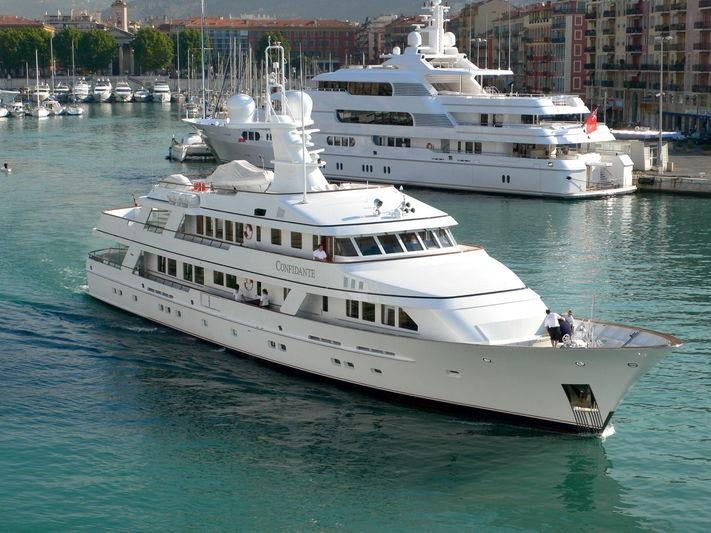 a large white boat in the water aboard GENESIA Yacht for Charter
