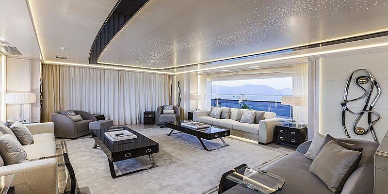 a living room with a large window aboard PARILLION Yacht for Charter