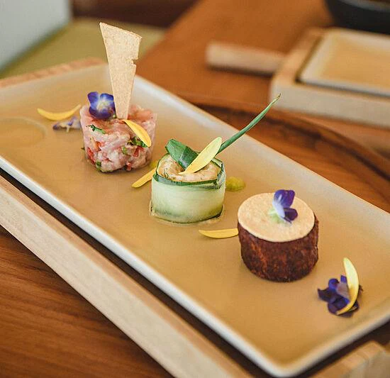 a group of cupcakes on a table aboard KUDANIL EXPLORER Yacht for Charter