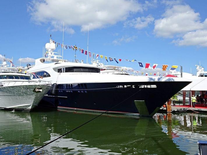 a couple of boats are parked in a harbor aboard MISS CHRISTINE Yacht for Charter
