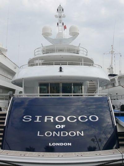 a large ship in a harbor aboard SIROCCO Yacht for Charter