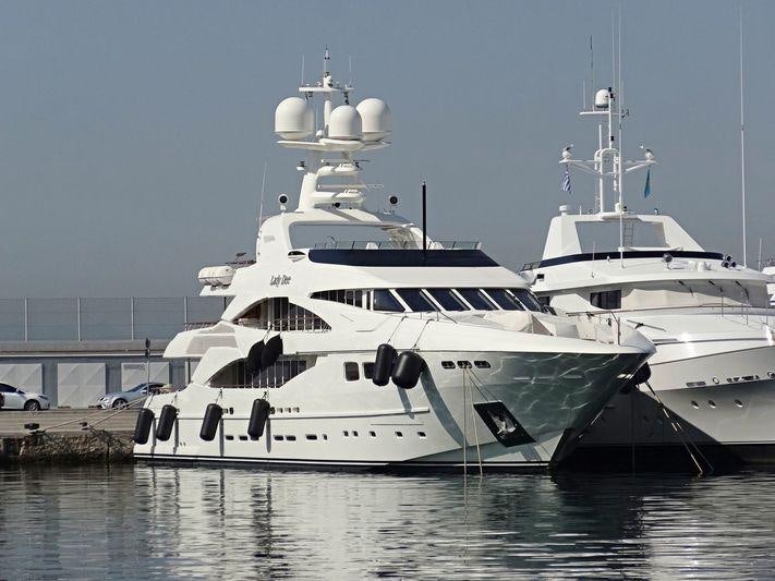 a couple of large white yachts aboard LADY DEE Yacht for Charter